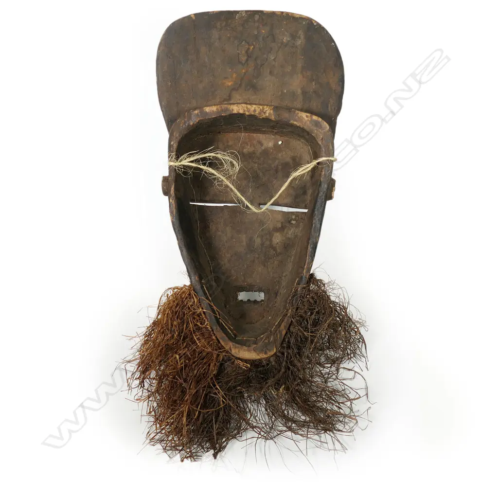 A carved wood African Songe mask, Image 1++